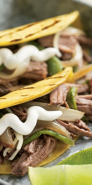 Beef brisket tacos with sour cream