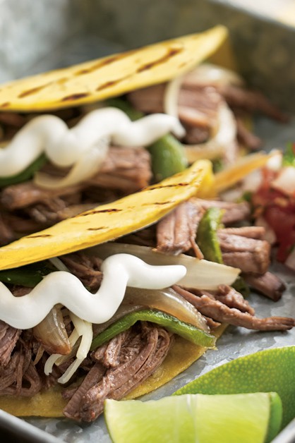 Beef brisket tacos with sour cream