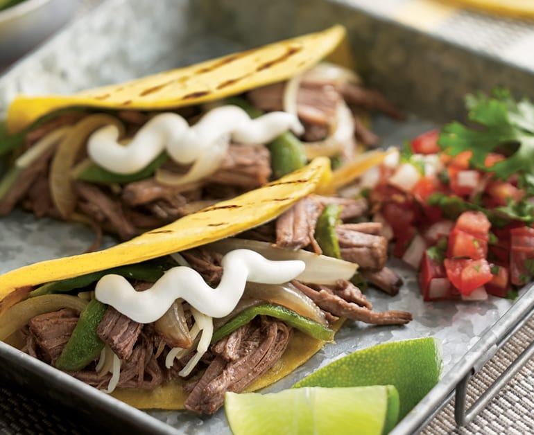 Beef brisket tacos with sour cream