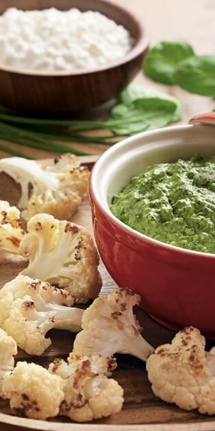 roasted cauliflower with three greens dip on the side