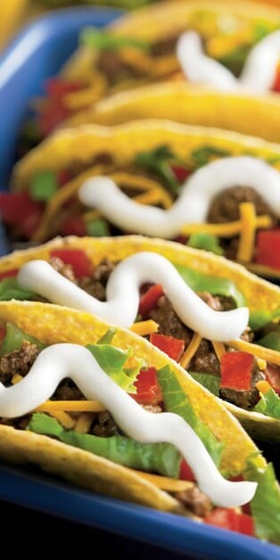 Beef tacos with sour cream