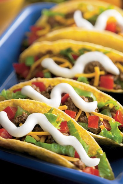 Beef tacos with sour cream