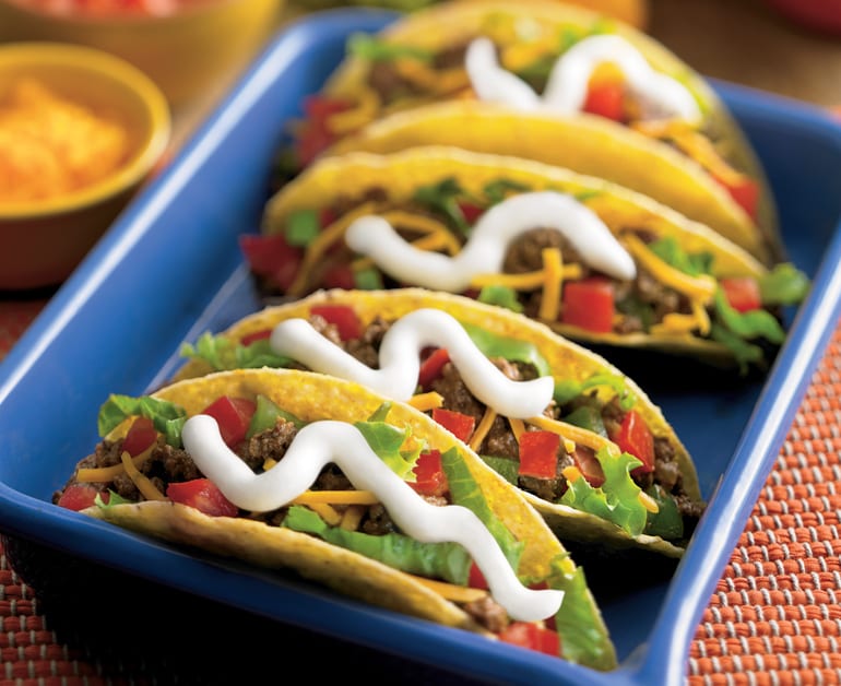 Beef tacos with sour cream